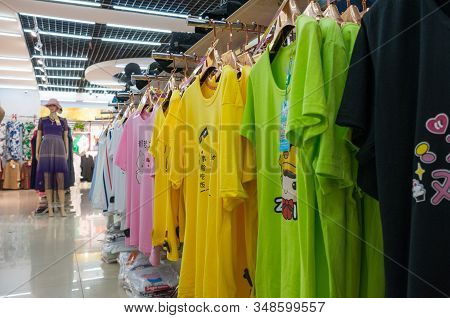 China, Heihe, July 2019: Department In A T-shirt Shop In Huafu Mall