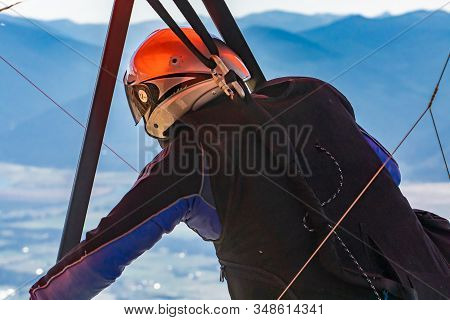Close-up View Of Hang Glider Pilot In Special Equipment And Clothing Ready To A Flight. Kootenay Val