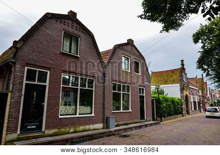 Edam, The Netherlands, August 2019. The Architecture Of The Edam Lodges Is A Characteristic Example 
