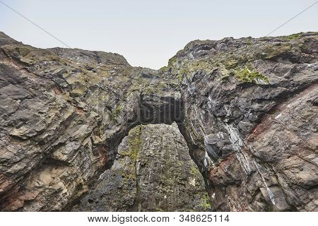 Faroe Islands Cliffs Rocky Archs In Vestmanna Area. Streimoy Island