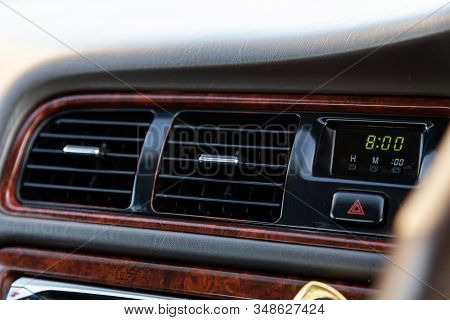 A Close-up View Of The Interior Of A Modern Luxury Car With A Ventilation Deflector For Heating And 