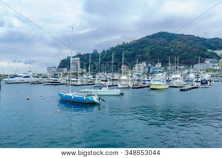 View Of The Marina, City And Castle, In Atami, Izu Peninsula, Japan