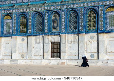 Arab Women In Hijab, Burka Walking Near The Dome Of The Rock Islamic Shrine On The Temple Mount In T