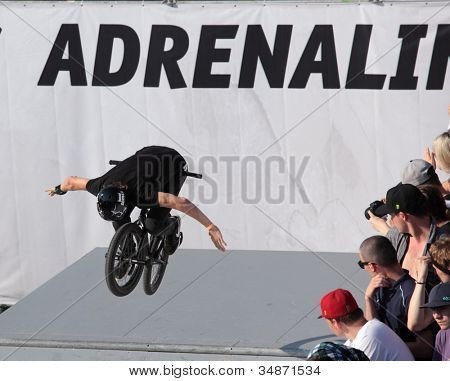 MOSCOW, RUSSIA - JULY 8: Maxim Chuprina, Russia, in BMX competitions during Adrenalin Games in Moscow, Russia at July 8, 2012