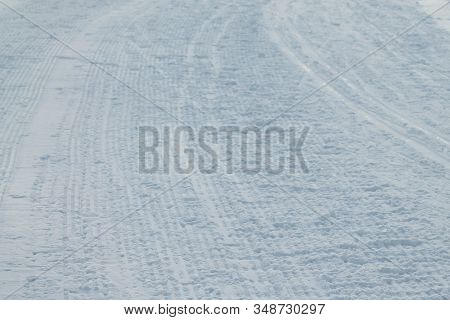 Rribbed Footprint In Snow Left Snowcat. Preparation Of Ski Slopes. The Concept Of Snow Removal, Ski 
