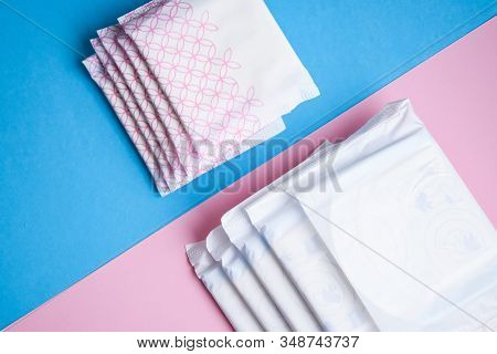 Menstruation Sanitary Pad For Woman Hygiene Protection. Critical Days. Medical Conception On The Blu
