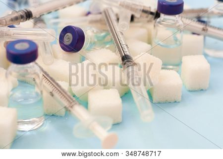 Sugar Addiction, Insulin Resistance, Unhealthy Diet, Sugar Cubes, Bottles Of Insulin And Syringe For