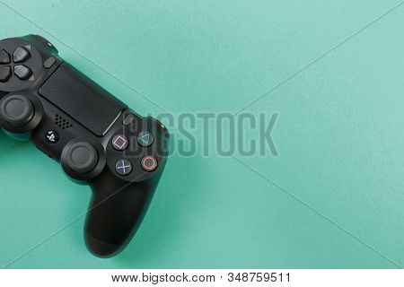 Russia, Oktober 24 2019: Game Joystick. Playstation. On A Blue Background Top View. The New Sony Dua