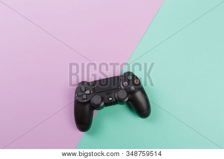 Russia, Oktober 24 2019: Computer Game Competition. Gaming Concept. Joysticks Isolated On Color Back