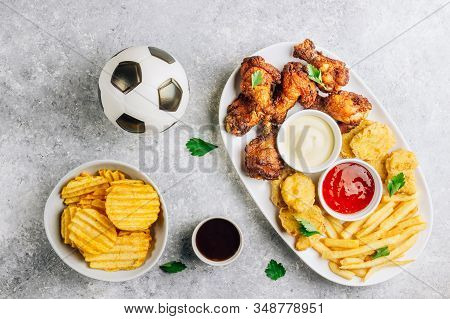 Table Fof Tasty Snacks For Beer Prepared For Watching Sports On Tv. Chicken. Chicken Wings, Chicken 