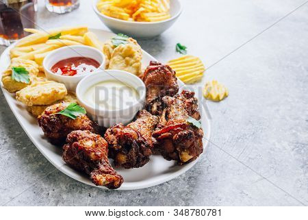 Table Fof Tasty Snacks For Beer Prepared For Watching Sports On Tv. Chicken. Chicken Wings, Chicken 