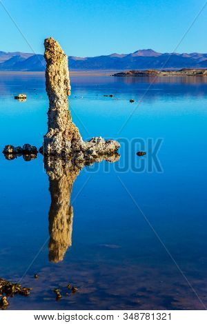 California, USA. Mono Lake. Picturesque lake with lime-tuff towers Tufa - of fancy shape. Evening by the lake. Dusk. The concept of ecological, exotic and photo tourism