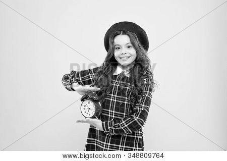 Happy Hours Concept. Schedule And Timing. Girl With Alarm Clock. Set Up Alarm Clock. Child Little Gi