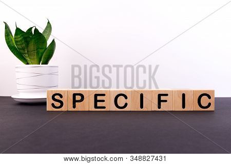 Specific Word Written On Wooden Cubes On A Light Background