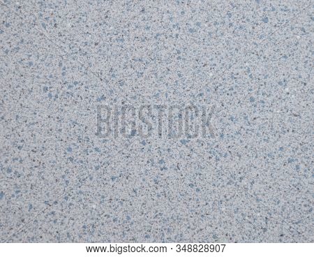 Gray Garnit Polished Surface Of Natural Stone With A Splash Of White.