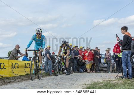Gruson, France - April 12,2015: Daniil Fominykh Of Team Astana And Jay Robert Thomson Of Mtn-qhubeka