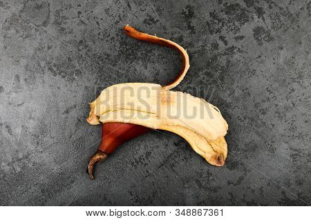 Red Bananas On A Dark Background. Red Bananas Are Shorter, A Kind Of Banana. Brown Banana Variety.