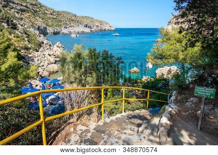 Concrete Stairs With Rails To Small Beach In Anthony Quinn Bay (rhodes, Greece)