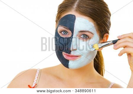 Girl Black Mask On Half Face Apply White Mud