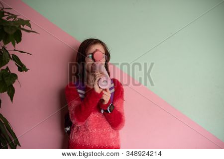 Girl With Cup. Schoolgirl Girl In Glasses Drinks Water From A Thermomug.a Schoolgirl Drinks Tea, Jui