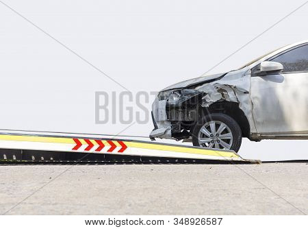 Accident Car Slide On  Truck For Move. Gray Car Have Damage By Accident On Road Take With Slide Truc