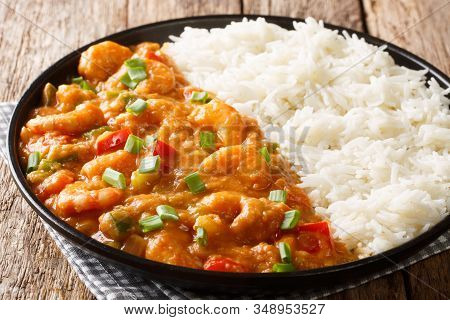 Creole Shrimp Etouffee Dish With Celery, Onion And Pepper Cooked In Roux Sauce Served With Rice Clos