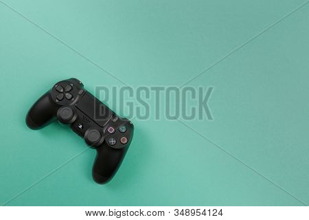 Russia, Oktober 24 2019: Game Joystick. Playstation. On A Blue Background Top View. The New Sony Dua