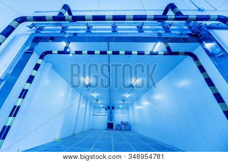 Empty Industrial Freezer Warehouse For Vegetable Storage.