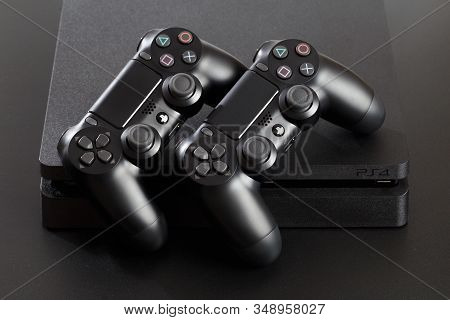 Russia, Oktober 24 2019: The New Sony Dualshock 4 With Playstation 4. Sony Playstation 4 Game Consol