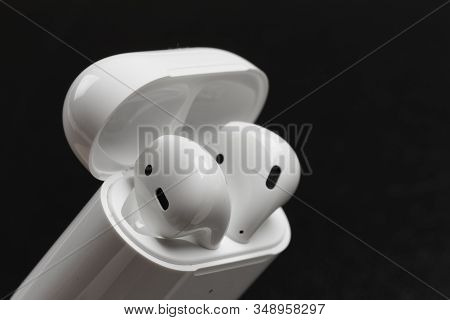 Air Pods. With Wireless Charging Case. New Airpods 2019 On Black Background.- Image .
