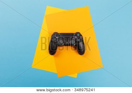 Russia, Oktober 24 2019: Computer Game Competition. Gaming Concept. Joysticks Isolated On Color Back