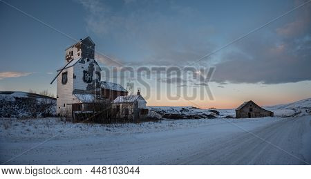 Sharples, Alberta - January 2, 2022: Old P&h Grain Company Elevator In The Ghost Town Of Sharples, A