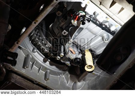 Modern Car In A Car Service On A Lift. Automatic Transmission Repair.