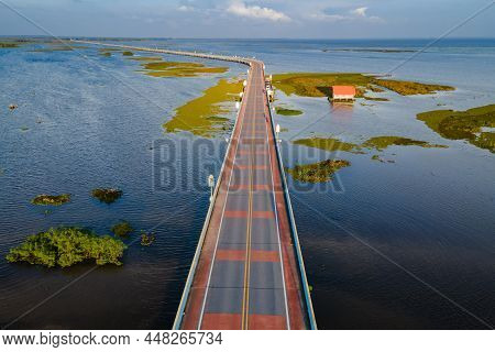 Aerial View Of Ekachai Bridge Or Chaloem Phrakiat 80 Phansa Bridge. Located In Thale Noi, Connect Be