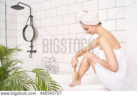Bathroom Skin Care. Body Brush Routine. Woman Peeling. Female Person Drainage Scrub. Wooden Massage.