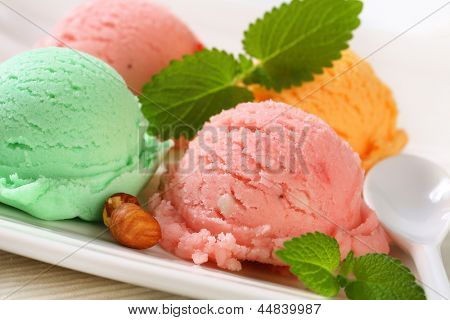 detail of ice cream selection with mint and almonds