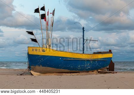Rewal, Poland - Circa August 2021: Fishing Boat On The Beach In Rewal Circa August 2021 In Rewal.