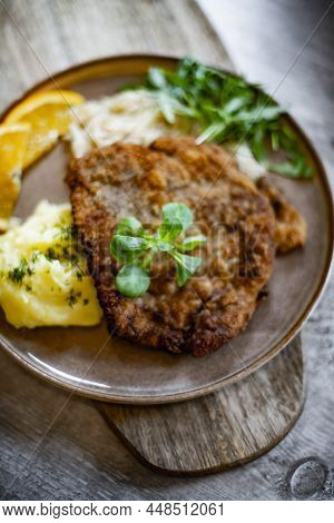 Pork Breaded Cutlet Coated With Breadcrumbs With Mashed Potatoes