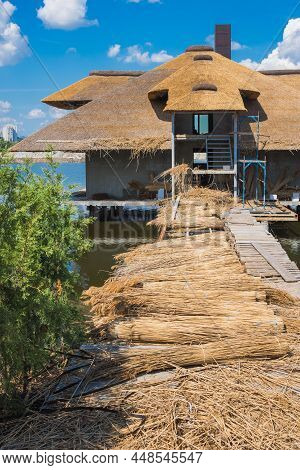 Ukraine, Dnipro, July 2021. Construction Of A Bungalow On The Water In The Sports, Sailing And Touri