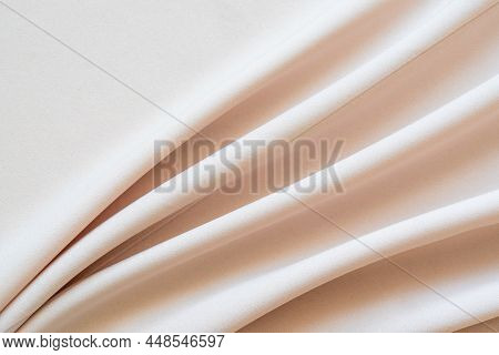 Abstract Beige Cloth Texture Background With Folds. Copy Space