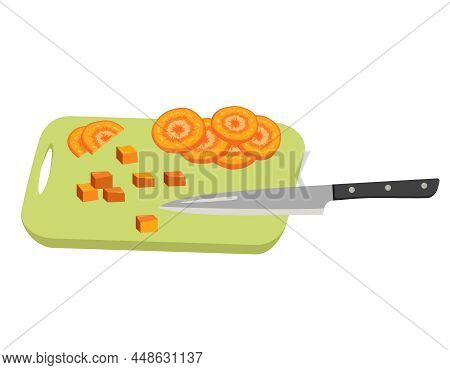 Orange Carrot Slices And Cubes Cut With Knife On Board. Healthy Vegetables And Delicious Food For Sa