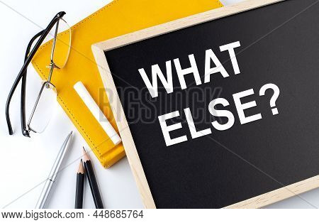 What Else Text On Blackboard With Notepad , Pen, Pencil