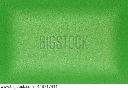 Background Made Of Green Felt With A Dark Rectangular Vignette On The Edges
