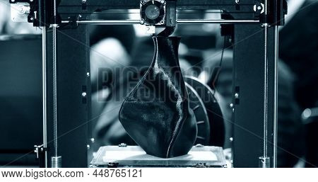 3d Printer Printing A Model In The Form Of Black Vase Close-up