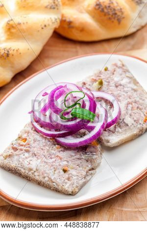 salty jelly called sulc with red and spring onion