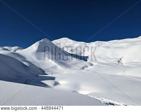 Ski Mountaineering On The Girenspitz And Schafberg In St. Antonien Above Partnun, Graubunden. Ski To