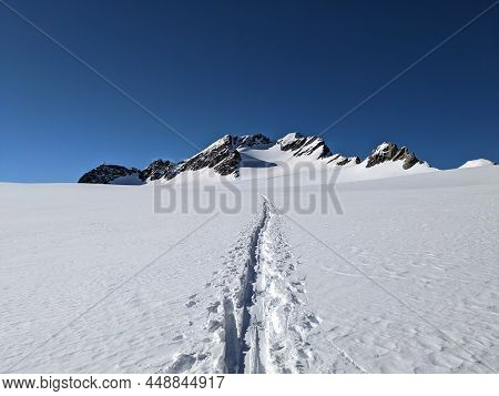 Ski Touring Trail In The Mountains. Alps In Europe, Switzerland. Ski Mountaineering On The Clariden 