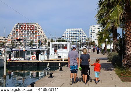 La Grande-motte, France - October 2, 2021: People Visit Famous Centrally Planned Resort Town La Gran