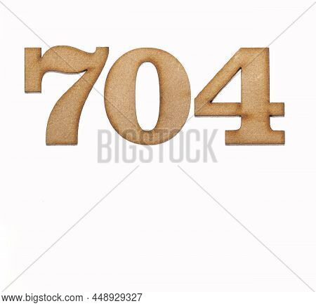 Number 704 - Piece Of Wood Isolated On White Background