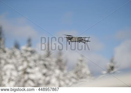 Aerial Photography From A Birds Eye View, A Helicopter Flies In The Forest, Takes Pictures Of Nature